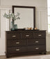 Covetown King Panel Bed with Mirrored Dresser and Chest