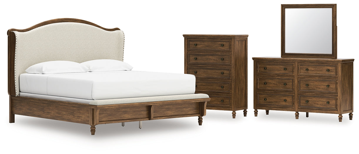 Sturlayne King Upholstered Panel Bed with Mirrored Dresser and Chest