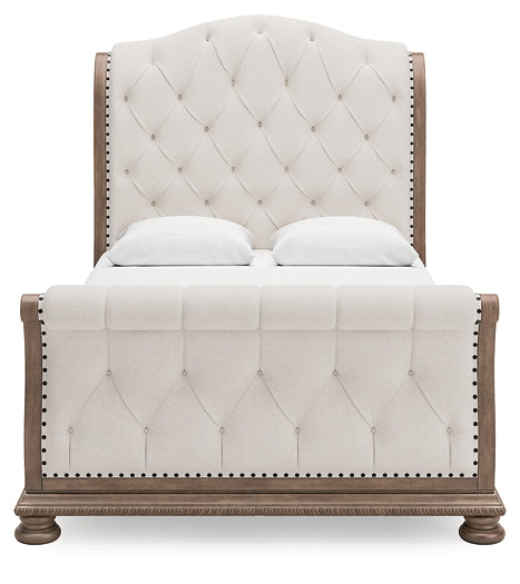 Ardenfield Queen Upholstered Sleigh Bed with Mirrored Dresser and Chest