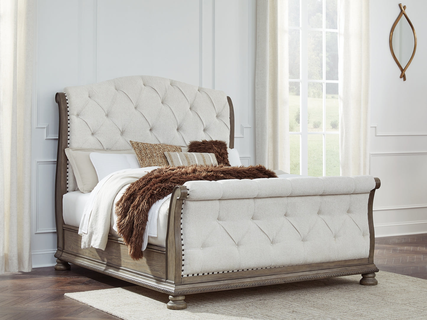 Ardenfield Queen Upholstered Sleigh Bed with Mirrored Dresser and Chest