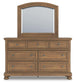 Feddinger Queen Storage Sleigh Bed with Mirrored Dresser and Nightstand