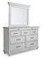 Kanwyn King Panel Bed with Mirrored Dresser and Chest